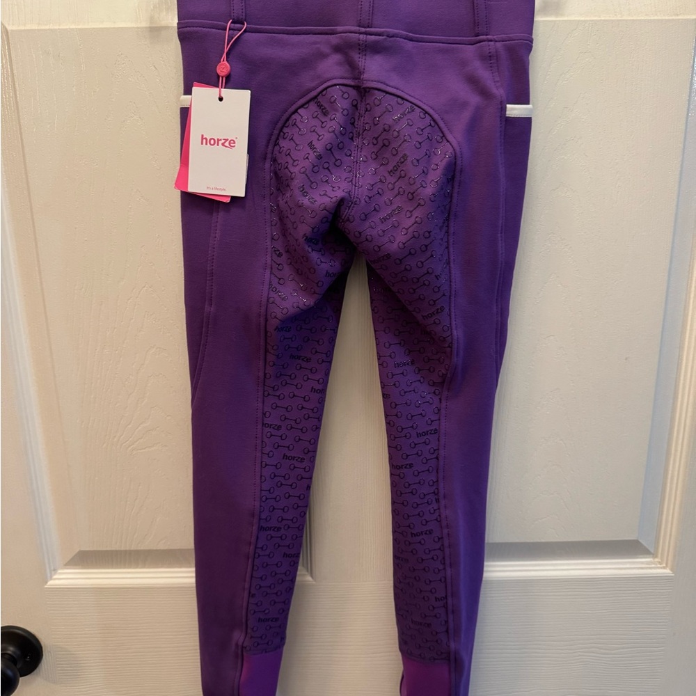 Horze Lucinda riding tights. Size Jr L. Full seat. NWT. Purple. Smoke free home.